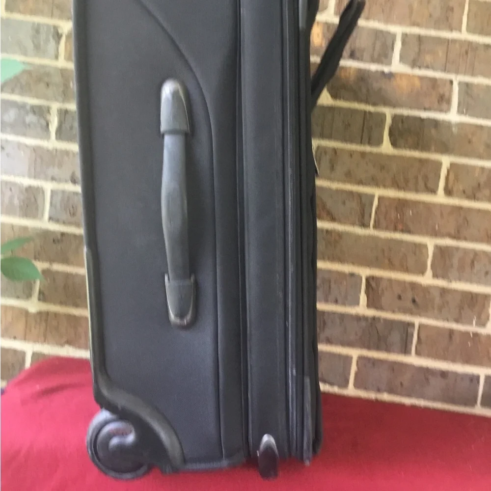 Tumi Black Men's Rolling Carry-On Travel Bag